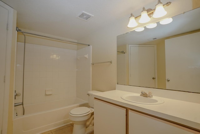2208 Antigua Pl Unit 932, Kissimmee, FL 34741 - bathroom featuring vanity, toilet, tile patterned floors, and shower / tub combination
