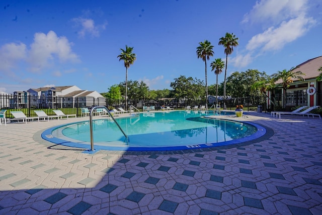 2208 Antigua Pl Unit 932, Kissimmee, FL 34741 - community pool with fence and a patio area