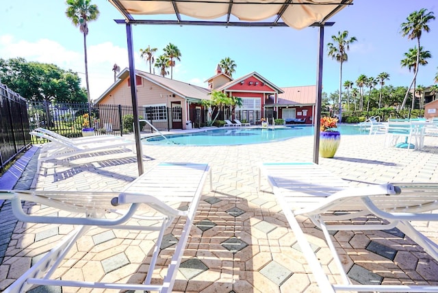 2208 Antigua Pl Unit 932, Kissimmee, FL 34741 - community pool featuring fence and a patio area