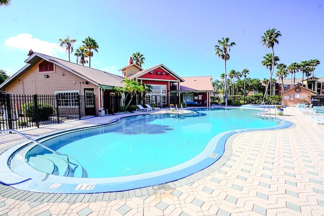 2208 Antigua Pl Unit 932, Kissimmee, FL 34741 - community pool featuring fence and a patio