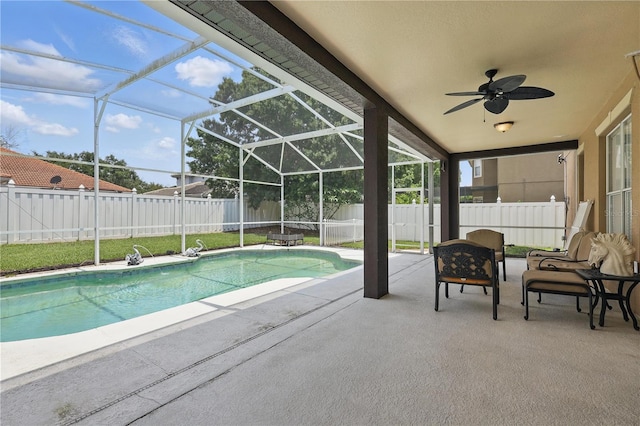 view of pool featuring a patio area, a fenced backyard, and a lanai