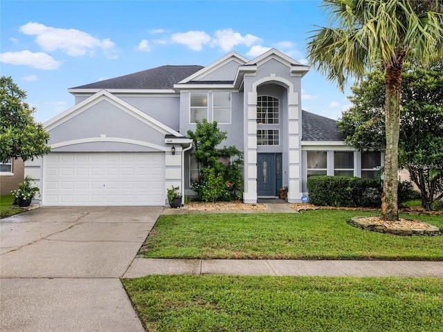 408 Becky St, Orlando, FL 32824 - traditional home featuring concrete driveway, an attached garage, a shingled roof, a front yard, and stucco siding