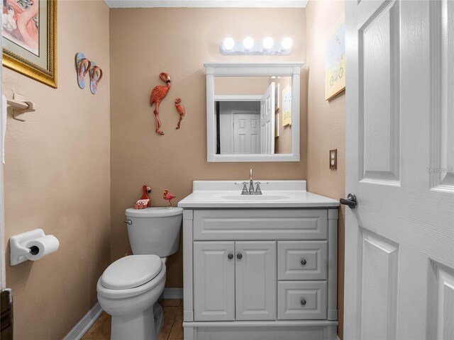 408 Becky St, Orlando, FL 32824 - half bath with toilet, vanity, and baseboards