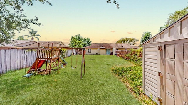 12381 Antonio Cir, Orlando, FL 32826 - view of yard at dusk