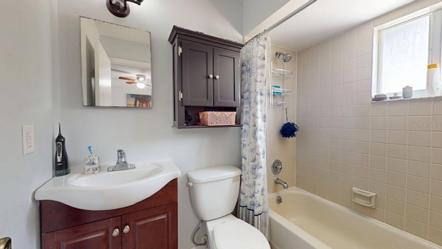 12381 Antonio Cir, Orlando, FL 32826 - bathroom featuring shower / bathtub combination with curtain, vanity, toilet, and ceiling fan