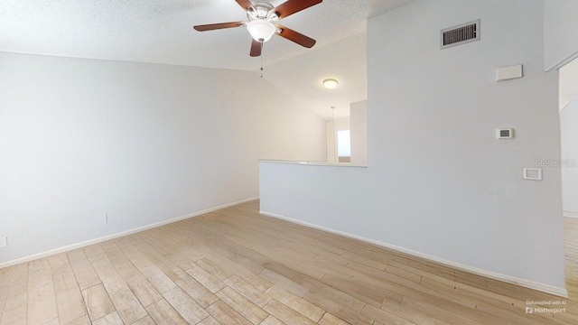 12381 Antonio Cir, Orlando, FL 32826 - unfurnished room with a ceiling fan, light wood-style flooring, baseboards, and lofted ceiling