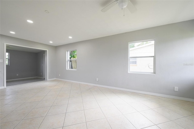 4824 Shoshone St, Orlando, FL 32819 - spare room featuring baseboards, a ceiling fan, recessed lighting, and light tile patterned floors