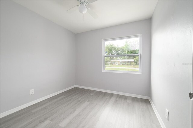4824 Shoshone St, Orlando, FL 32819 - empty room with light wood-type flooring, baseboards, and ceiling fan