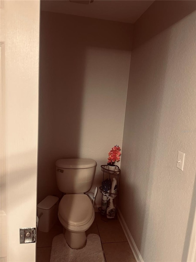 6450 Alcalde Ct Unit 106, Orlando, FL 32835 - bathroom with toilet and tile patterned flooring