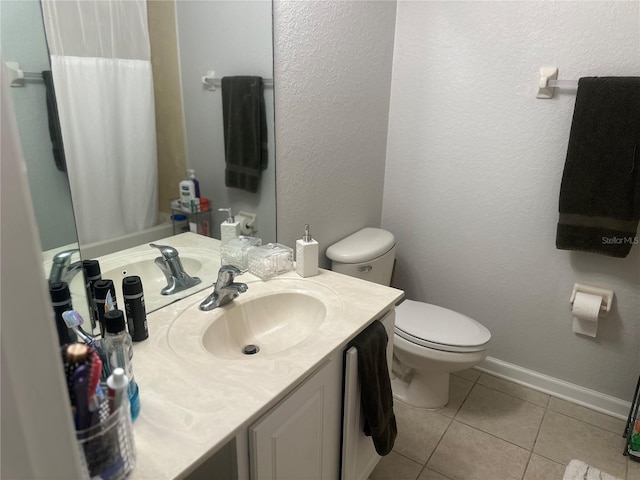 6450 Alcalde Ct Unit 106, Orlando, FL 32835 - full bathroom featuring tile patterned floors, vanity, and curtained shower