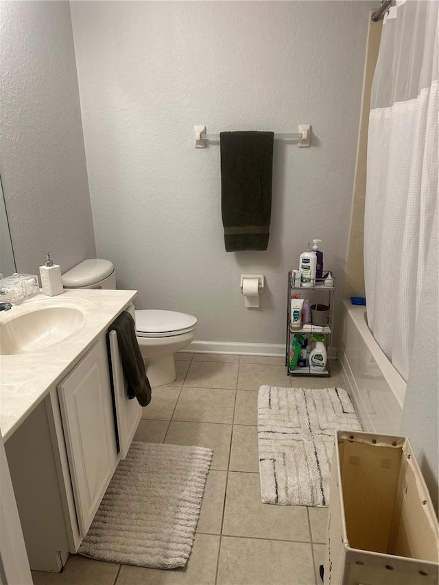 6450 Alcalde Ct Unit 106, Orlando, FL 32835 - bathroom with vanity, tile patterned floors, and shower / bath combo with shower curtain