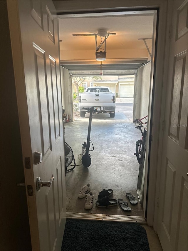 6450 Alcalde Ct Unit 106, Orlando, FL 32835 - garage with a garage door opener