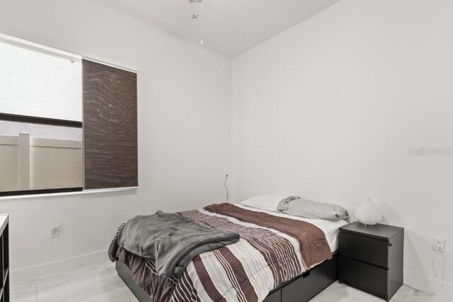 4445 SW 173rd Ave, Miramar, FL 33029 - bedroom featuring marble finish flooring and baseboards