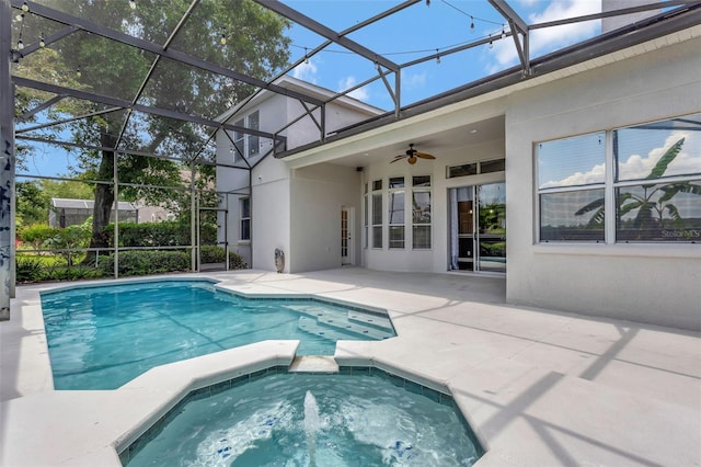 12411 Scarlett Sage Ct, Winter Garden, FL 34787 - view of swimming pool featuring a ceiling fan, a patio area, and a pool with connected hot tub