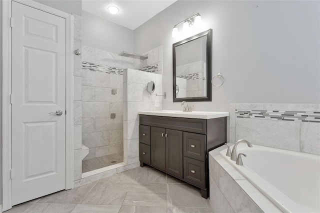 12411 Scarlett Sage Ct, Winter Garden, FL 34787 - full bathroom with walk in shower, vanity, and a bath