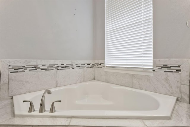 12411 Scarlett Sage Ct, Winter Garden, FL 34787 - bathroom featuring a bath