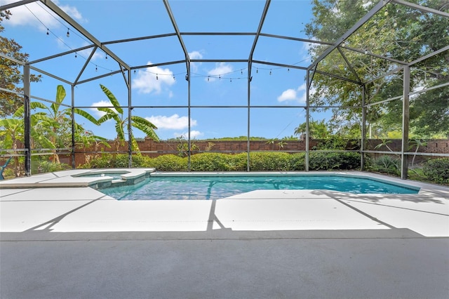 12411 Scarlett Sage Ct, Winter Garden, FL 34787 - view of pool featuring a pool with connected hot tub, a patio area, fence, and a lanai