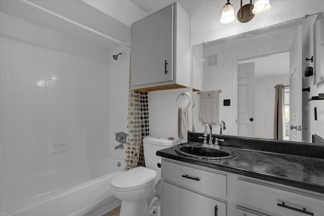 full bath with vanity, washtub / shower combination, and toilet
