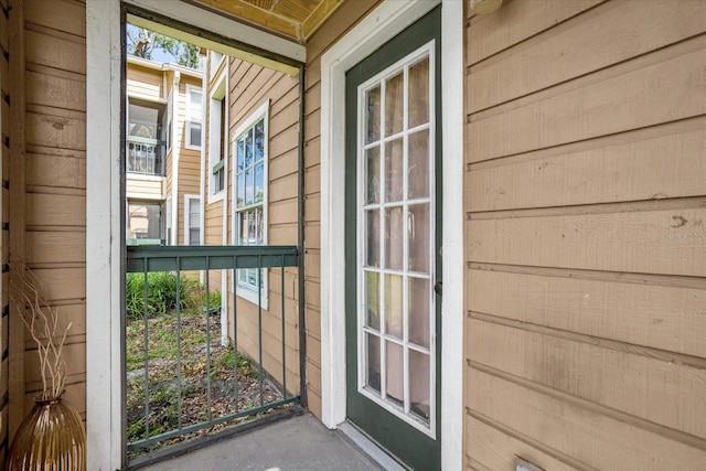 property entrance featuring covered porch