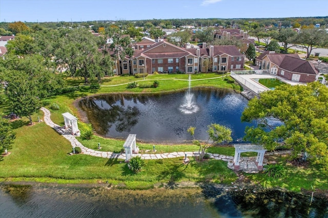 aerial perspective of suburban area featuring a nearby body of water