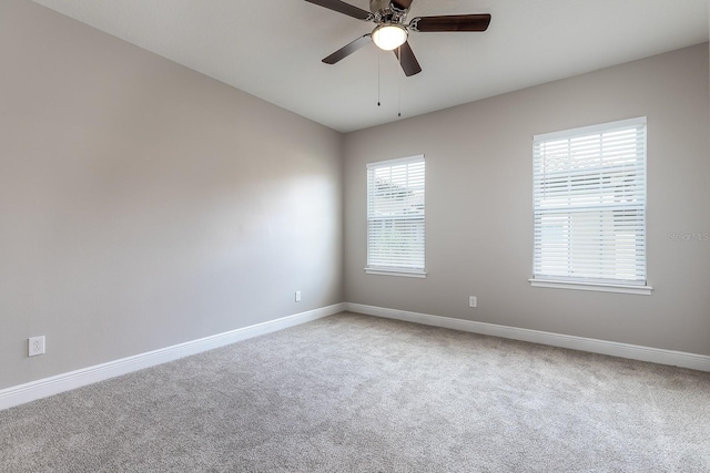 625 Pavia Loop, Lake Mary, FL 32746 - spare room with carpet floors, baseboards, and a ceiling fan