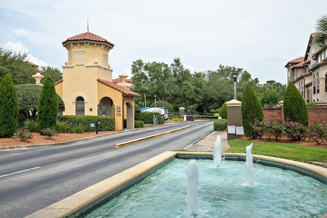 625 Pavia Loop, Lake Mary, FL 32746 - view of asphalt street with street lights and curbs
