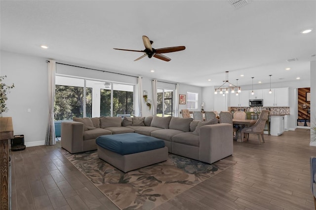 2539 Auburn Ridge Dr, Apopka, FL 32712 - living area featuring healthy amount of natural light, ceiling fan, recessed lighting, and wood finished floors