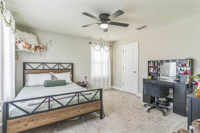 2539 Auburn Ridge Dr, Apopka, FL 32712 - bedroom featuring a desk, carpet flooring, ceiling fan, baseboards, and a textured ceiling