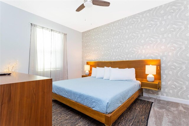 2836 Simile St, Kissimmee, FL 34746 - bedroom featuring wallpapered walls, carpet floors, baseboards, and a ceiling fan