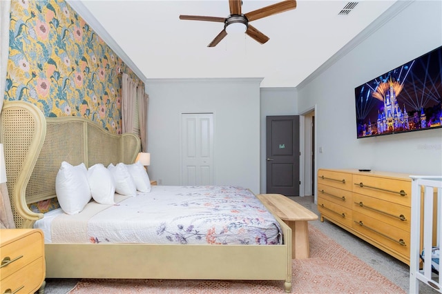 2836 Simile St, Kissimmee, FL 34746 - carpeted bedroom featuring ornamental molding, a closet, and ceiling fan