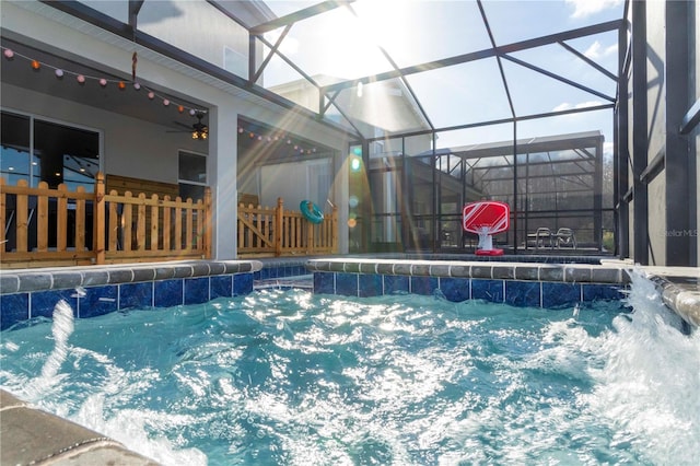2836 Simile St, Kissimmee, FL 34746 - outdoor pool featuring ceiling fan and glass enclosure