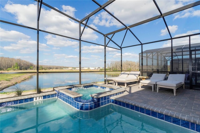 2836 Simile St, Kissimmee, FL 34746 - swimming pool featuring an in-ground hot tub, a water view, glass enclosure, and a patio area