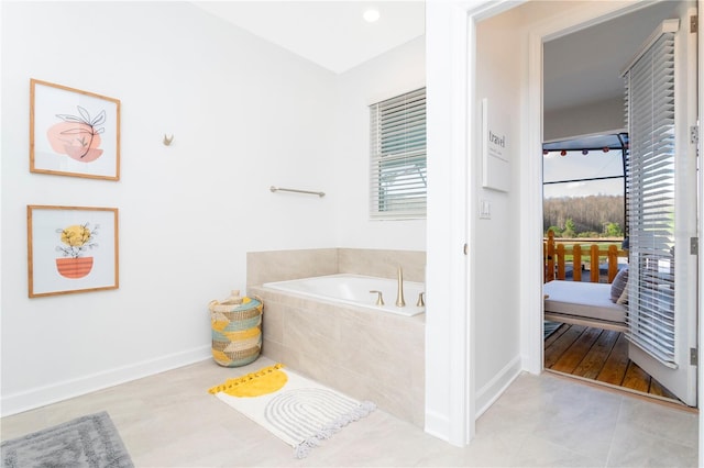 2836 Simile St, Kissimmee, FL 34746 - full bathroom with a bath and baseboards