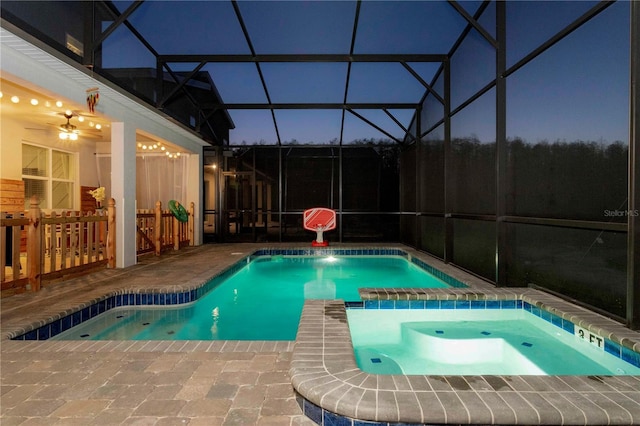 2836 Simile St, Kissimmee, FL 34746 - view of pool featuring a patio, a pool with connected hot tub, and glass enclosure