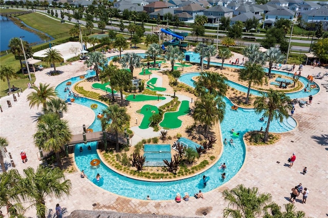 2836 Simile St, Kissimmee, FL 34746 - bird's eye view of a nearby body of water and a pool area