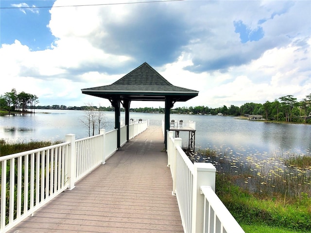 dock area with a gazebo and a water view