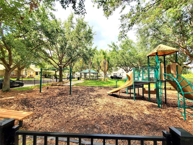 community playground with fence and a gazebo