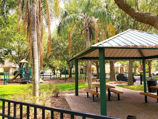 view of community featuring a gazebo and fence