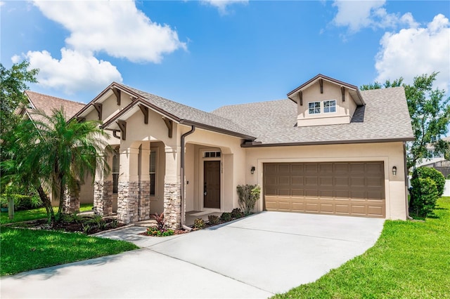 6728 Duncaster St, Windermere, FL 34786 - view of front of house with stucco siding, driveway, a garage, a front yard, and stone siding