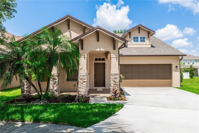 6728 Duncaster St, Windermere, FL 34786 - view of front of home with stucco siding, an attached garage, driveway, and stone siding