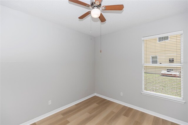 6728 Duncaster St, Windermere, FL 34786 - spare room featuring light wood-style floors, baseboards, and ceiling fan
