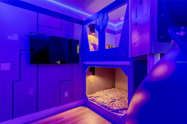 unfurnished bedroom featuring wood finished floors