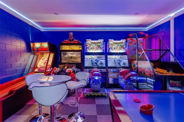 recreation room with tile patterned floors