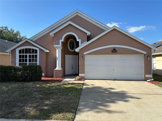 6625 Cherry Grove Cir, Orlando, FL 32809 - view of front of property featuring stucco siding and driveway