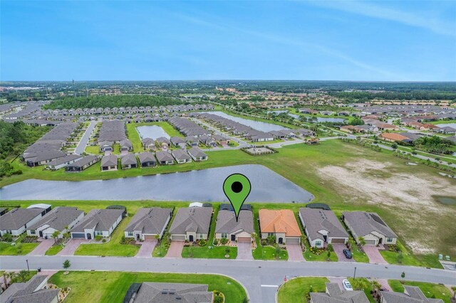636 San Augusto Dr, Kissimmee, FL 34759 - aerial view of property and surrounding area with nearby suburban area and a large body of water