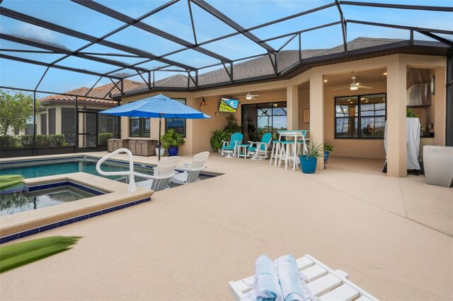 636 San Augusto Dr, Kissimmee, FL 34759 - view of pool with ceiling fan, a patio, and a pool with connected hot tub