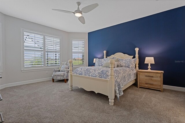 636 San Augusto Dr, Kissimmee, FL 34759 - bedroom with baseboards, carpet floors, and a ceiling fan