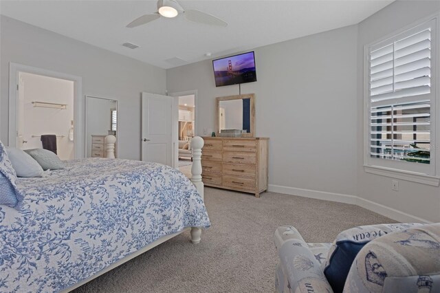 636 San Augusto Dr, Kissimmee, FL 34759 - bedroom featuring light colored carpet, a ceiling fan, and baseboards