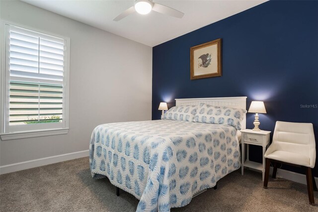 636 San Augusto Dr, Kissimmee, FL 34759 - carpeted bedroom featuring multiple windows, baseboards, and ceiling fan