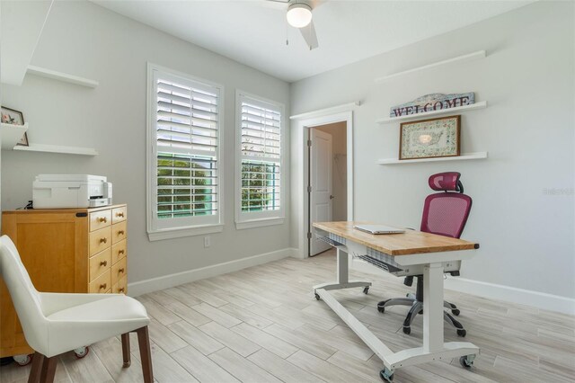 636 San Augusto Dr, Kissimmee, FL 34759 - office featuring baseboards, ceiling fan, and light wood-style flooring